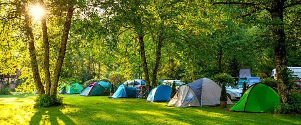 "Ground camping tent setup in Uganda’s national park"