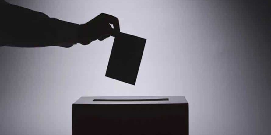 A person casting a ballot during Uganda’s 2026 general elections, symbolizing peace and democracy