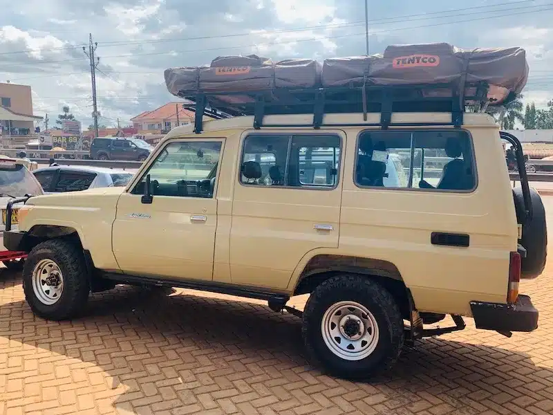 Rooftop camping with extended Land Cruiser 